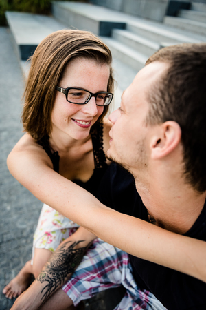 Romantic woman embracing her partner in loveの写真素材