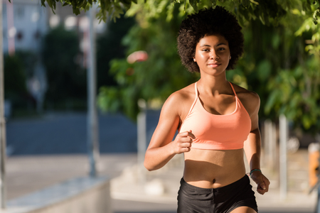 Runner woman. Fitness jogging workout concept.の写真素材