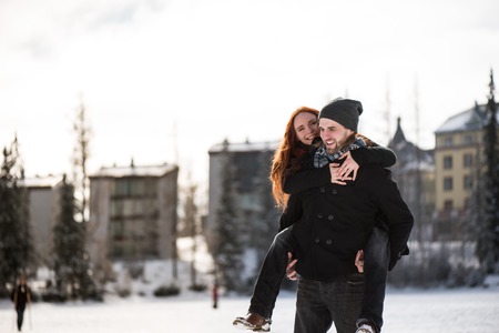 Winter couple having fun in snowy Tatra mountains