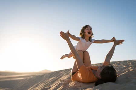 Having fun together - mother and daughterの写真素材