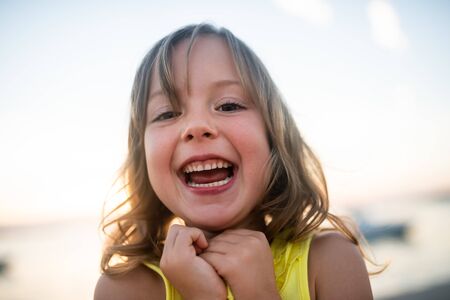 Joyous girl child having fun outdoorsの写真素材