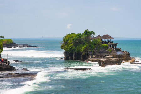 Tanah Lot water temple in Bali. Indonesia nature landscape. Tanah Lot temple in daylight, Bali island. Popular temple of Bali, Indonesia landmark. Famous Bali water temple.のeditorial素材