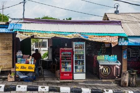 several market place and workers around at Tanah Lot water temple in Bali, a popular temple. Tanah Lot temple in daylight, Bali island.のeditorial素材