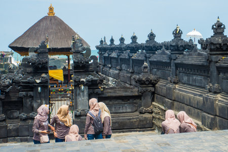 People enjoy their free time around Besakih Temple is a pura complex in the village of Besakih on the slopes of Mount Agung in eastern Bali, Indonesia. It is the most important, the largest and holiest temple of Hindu religion in Bali, and one of a seriesのeditorial素材
