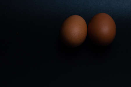 Minimal composition of traditional healthy italian food. Tasty and fresh brown chicken eggs, raw and...