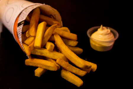 French fries with sauce, deep fried Homemade Baked potato chips with fresh mayo