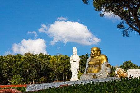 Buddha sculpture at BacalhÃ´a Buddha Eden, asian style garden, Quinta dos Loridos, Bombarral, Portugal, September 10, 2020のeditorial素材