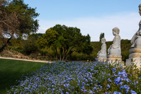 Buddha sculpture at BacalhÃ´a Buddha Eden, asian style garden, Quinta dos Loridos, Bombarral, Portugal, September 10, 2020のeditorial素材