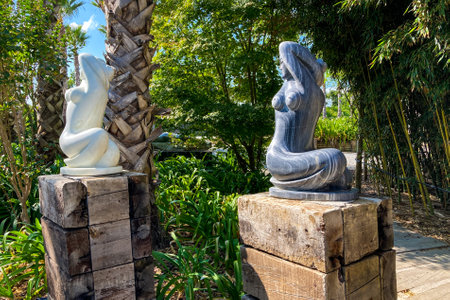 Lisbon / Portugal: 10/09/2020: Amazing view of the buddha garden with a composition of different sculptures in brass or stone. more in asian style, other in greek style.のeditorial素材