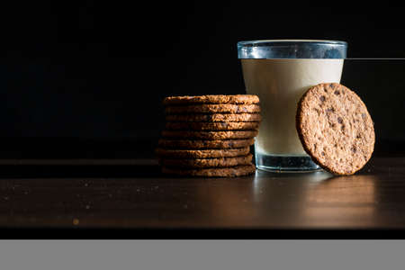 Serving healthy morning breakfast with a fresh milk in a glass and Pile of Delicious Chocolate...