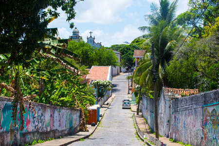 Olinda/Brazil: 09/02/2018: Facades of colorful houses on the streets of Olinda, near Recife, Pernambuco, Brazil on December 15, 2013. The historical town of Olinda is considered by UNESCO, a world heritage site.のeditorial素材
