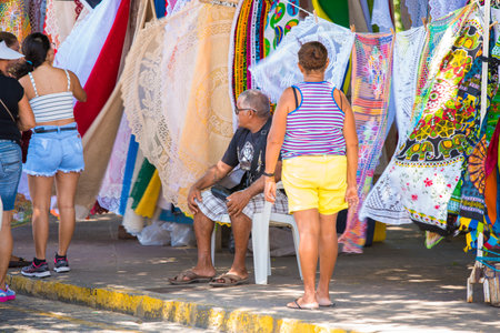 Olinda /Brazil : 09/02/2018: Colorful Brazilian street market in the historic streets of Olinda in Pernambuco, Brazil with its cobblestones and buildings when Brazil was a Portuguese colony.のeditorial素材