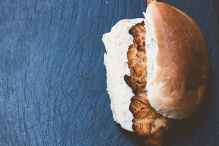 fried mozzarella cheese and fried hot-dog with soft white bread and crispy french fries with sauces. Southern Country Fried Chicken Sandwich with Mayo and fried potatoes.の写真素材