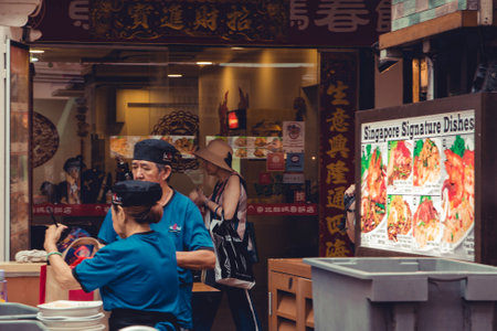Singapore - May 03, 2019 - Chinatown in Singapore, the famous place for tourists to visit many shops and street food. Inexpensive food stalls are numerous in the city so Singaporeans dine outのeditorial素材