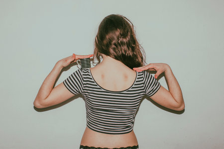 High fashion look glamor stylish beautiful young brunette woman model with red lips in summer bright colorful hipster summer cloth. Funny crazy glamor stylish sexy smiling girl in natural posing.の写真素材