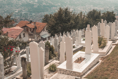 SARAJEVO, BOSNIA AND HERZEGOVINA, 05 JULY 2017 - Muslim cemetery dedicated to the victims of the Bosnian war, in Sarajevo, Bosnia and Herzegovina. MartyrsâCemetery Kovaci is a memorial war graveyard.のeditorial素材