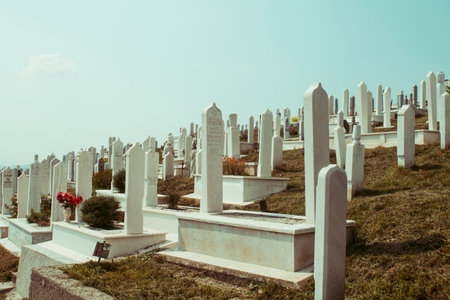 SARAJEVO, BOSNIA AND HERZEGOVINA, 05 JULY 2017 - Muslim cemetery dedicated to the victims of the Bosnian war, in Sarajevo, Bosnia and Herzegovina. MartyrsâCemetery Kovaci is a memorial war graveyard.のeditorial素材