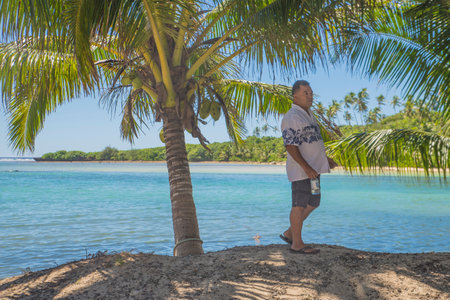 Rarotonga, Cook Island, 09 May 2019 : People enjoy their life vacation on the paradise island of Rarotonga, the Cook Island 's most famous place with his blue sea and white sand.のeditorial素材