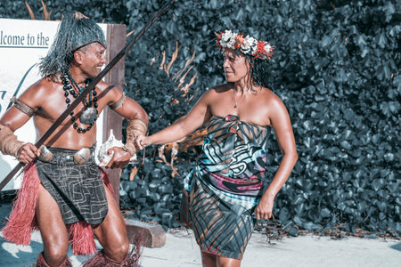 Rarotonga, Cook Island: 09 May 2019: view of People workers in traditional and typical costume on Rarotonga, beautiful beach place in Cook Island with blue sea and white sand.のeditorial素材