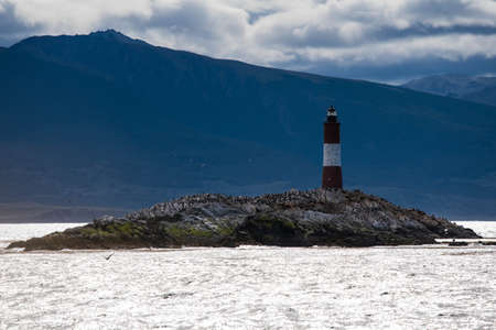 Bird Island in the Beagle Channel near the Ushuaia city. Ushuaia is the capital of Tierra del Fuego province in Argentina. Place full of birds and pinguin next to a lighthouse.の写真素材
