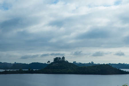 : The bay and harbor at Tauranga with calm water in front of the Mountの写真素材