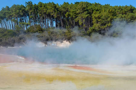 Geothermal Landscape with hot boiling mud and sulfur springs due to volcanic activity in Wai-O-Tapu, Thermal Wonderland New Zealandの写真素材