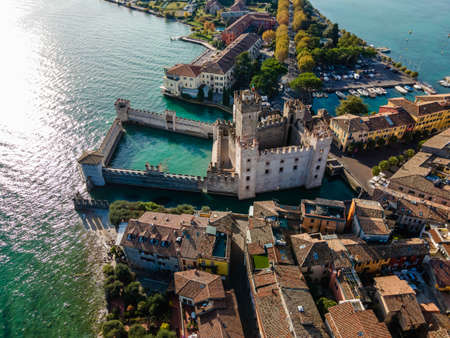 Aerial view of Castello Scaligero (Scaligero Castle), an ancient fortress along Sirmione coastal, Lombardy, italy.の写真素材