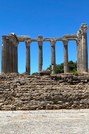 Evora, Portugal: 09/06/2021: Ancient roman temple of Diana in the old city of Evora, Portugal. Historical ruins part of the UNESCO World Heritage Siteのeditorial素材