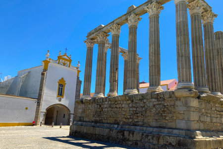 Evora, Portugal: 09/06/2021: Ancient roman temple of Diana in the old city of Evora, Portugal. Historical ruins part of the UNESCO World Heritage Siteのeditorial素材