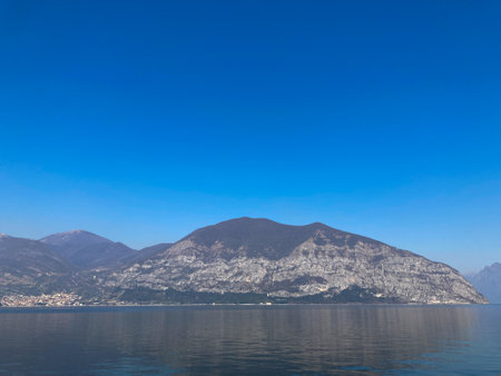 Bergamo, Italy: 10-02-2022: Panoramic of Lake Iseo, the fourth largest lake in Lombardy, Italy, fed by the Oglio River.のeditorial素材
