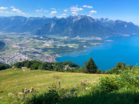 Panorama of the Switzerland Alpine mountains. Ridges, peaks and lakes are visible in the background. Beautiful view in the French Canton.の写真素材