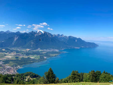 Panorama of the Switzerland Alpine mountains. Ridges, peaks and lakes are visible in the background. Beautiful view in the French Canton.の写真素材