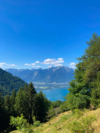 Panorama of the Switzerland Alpine mountains. Ridges, peaks and lakes are visible in the background. Beautiful view in the French Canton.の写真素材