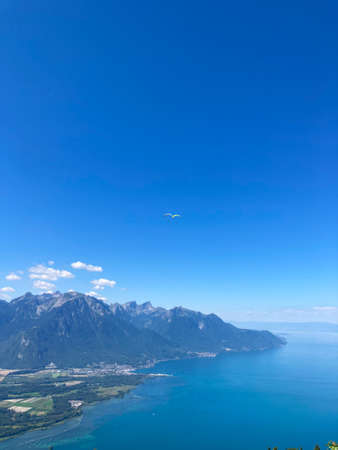 Panorama of the Switzerland Alpine mountains. Ridges, peaks and lakes are visible in the background. Beautiful view in the French Canton.の写真素材