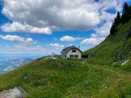Panorama of the Switzerland Alpine mountains. Ridges, peaks and lakes are visible in the background. Beautiful view in the French Canton.の写真素材