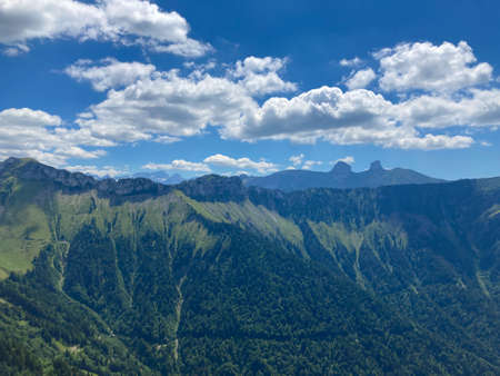 Panorama of the Switzerland Alpine mountains. Ridges, peaks and lake are visible in the background. Beautiful view in the French Canton.の写真素材