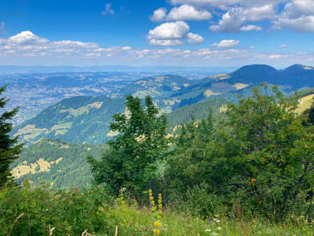 Panorama of the Switzerland Alpine mountains. Ridges, peaks and lake are visible in the background. Beautiful view in the French Canton.の写真素材