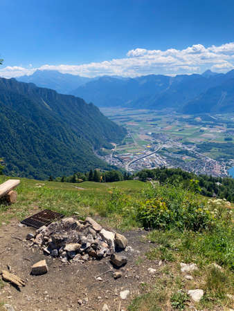 Panorama of the Switzerland Alpine mountains. Ridges, peaks and lake are visible in the background. Beautiful view in the French Canton.の写真素材
