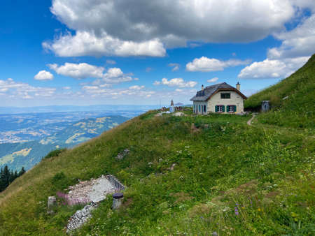 Panorama of the Switzerland Alpine mountains. Ridges, peaks and lake are visible in the background. Beautiful view in the French Canton.の写真素材