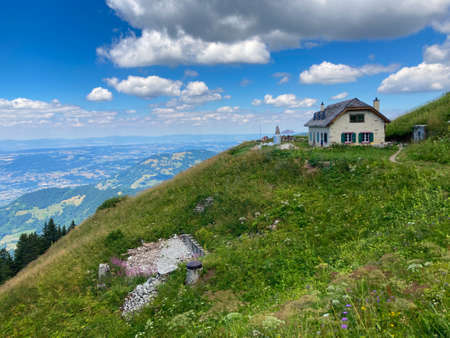 Panorama of the Switzerland Alpine mountains. Ridges, peaks and lake are visible in the background. Beautiful view in the French Canton.の写真素材