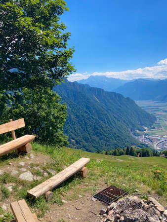 Panorama of the Switzerland Alpine mountains. Ridges, peaks and lake are visible in the background. Beautiful view in the French Canton.の写真素材