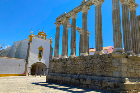 Evora, Portugal: 09/06/2021: Ancient roman temple of Diana in the old city of Evora, Portugal. Historical ruins part of the UNESCO World Heritage Siteのeditorial素材