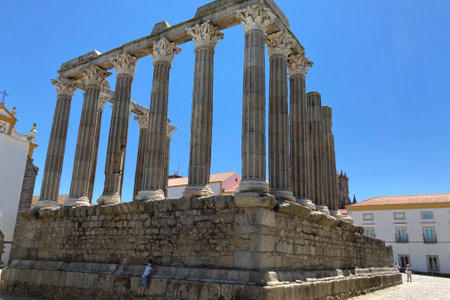 Evora, Portugal: 09/06/2021: Ancient roman temple of Diana in the old city of Evora, Portugal. Historical ruins part of the UNESCO World Heritage Siteのeditorial素材