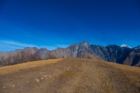 Georgia : 10-11-2022 : Country of Georgia, Kazbegi, Panoramic landscape of beautiful natural mountains, view of amazing Caucasus mountain peaks and meadows in Kazbegi national park.の写真素材