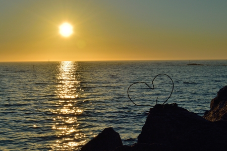 Heart and midnight sun in Andenes, northern Norwayの写真素材