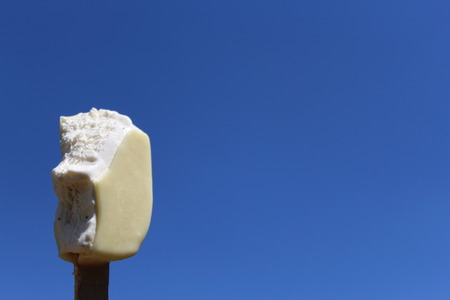 Ice cream in front of blue summer skyの写真素材