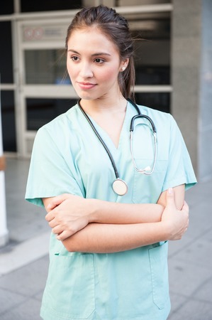 Young female nurse doctor with stethoscope の写真素材