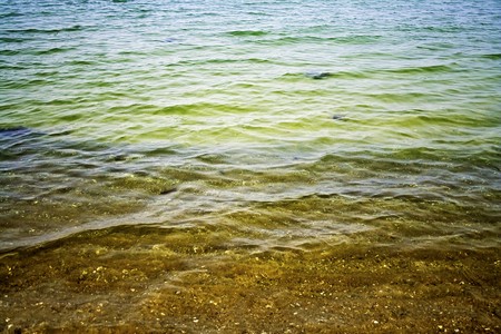 A colorful water background from the coastの写真素材