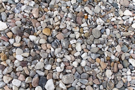 A variety of beach pebbles in different colorsの写真素材