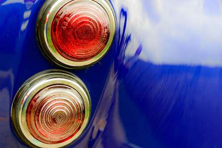 Restored blue Shelby Cobra with white racing stripes